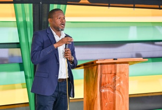 Acting Principal Director, Urban Renewal and Planning, Ministry of Economic Growth and Infrastructure Development, Raymond Poyser, addresses a recent public engagement session on renovation plans for the Rudolph Elder Park, held at the facility in Morant Bay, St. Thomas.