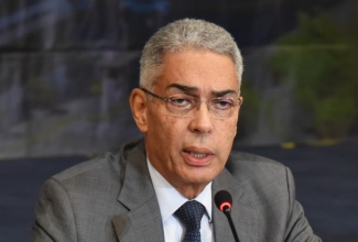 Governor, Bank of Jamaica (BOJ), Richard Byles, addressing the Quarterly Monetary Policy Report press conference at the BOJ auditorium in downtown Kingston on Tuesday (February 24).