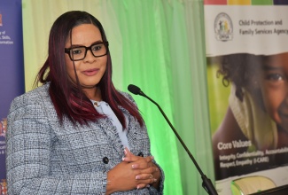 Chief Executive Officer of the Child Protection and Family Services Agency (CPFSA), Laurette Adams-Thomas, delivers remarks during the screening of the Children of Shanghai documentary and discussion forum on Monday (February 9) at The Jamaica Pegasus hotel in New Kingston.