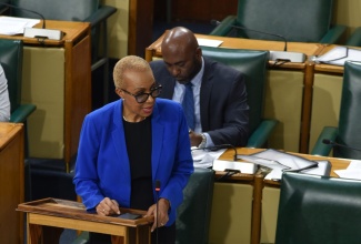 Minister of Finance and the Public Service, Hon. Fayval Williams, addressing the recent sitting of the House of Representatives.

