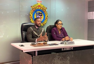 Mayor of Montego Bay, Councillor Richard Vernon, speaks during the St. James Municipal Corporation’s monthly meeting on February 12. Listening is the St James Municipal Corporation’s Chief Executive Officer, Naudia Crosskill, 

