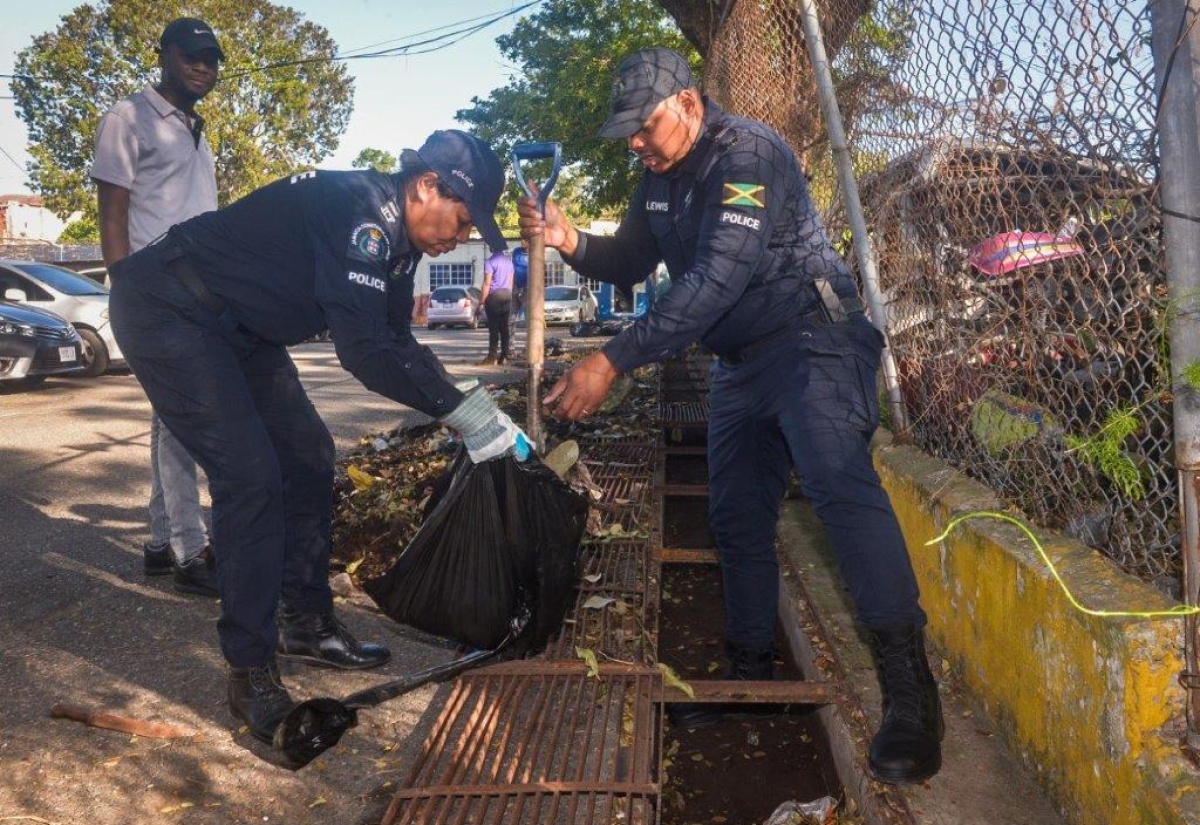 Constant Spring Police Partners with NSWMA to Clean Up Station Grounds