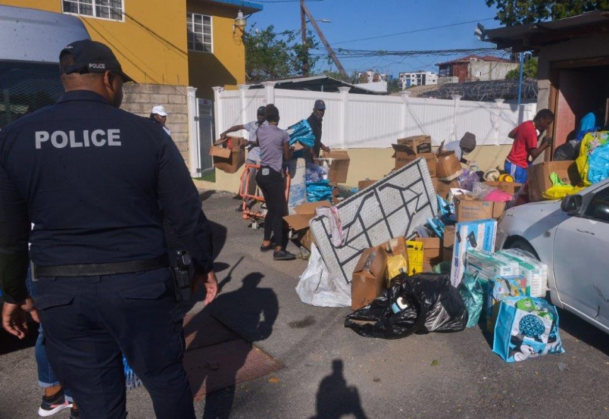 Constant Spring Police Partners with NSWMA to Clean Up Station Grounds