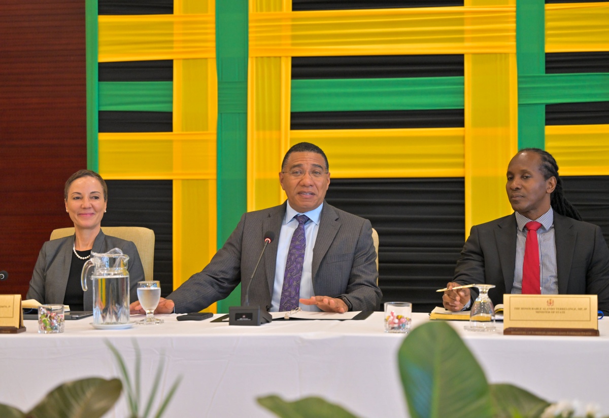Prime Minister, Dr. the Most Hon. Andrew Holness (centre), addresses Heads of Jamaica’s diplomatic and consular missions at the Ministry of Foreign Affairs and Foreign Trade in downtown Kingston recently. He is flanked by Minister of Foreign Affairs and Foreign Trade, Senator the Hon. Kamina Johnson Smith (left), and State Minister in the Ministry of Foreign Affairs and Foreign Trade, Hon. Alando Terrelonge.

