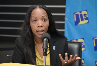 Administrative Manager in the Customer Relations Management Division, National Housing Trust, Shara Luke Cooper addresses a Jamaica Information Service Think Tank on February 5.

