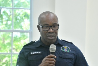 Head of the Westmoreland Police Division, Senior Superintendent of Police (SSP) Othneil Dobson, gives remarks during the monthly meeting of the Westmoreland Municipal Corporation in Savanna-La-Mar on Thursday (February 12).
