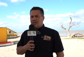 Minister of Water, Environment and Climate Change, Hon. Matthew Samuda, gives remarks during mangrove clean-up activities in Parottee, St. Elizabeth on Monday (February 2). 

