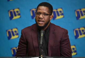 Medical Practitioner and Researcher, Dr. D. Malcolm Brewster, shares findings from his research on medical adherence at a JIS Think Tank on Thursday, March 19.