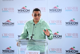 Prime Minister, Dr. the Most Hon. Andrew Holness, delivers the keynote address during the official launch of Chester Creek housing development at Westchester Drive in Portmore, St. Catherine, on Tuesday (March 3). 

