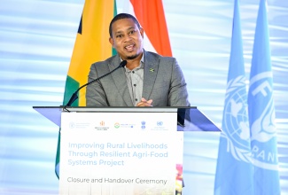 Minister of Agriculture, Fisheries, and Mining, Hon. Floyd Green, delivers the keynote address during the closing ceremony for the Improving Rural Livelihoods Through Resilient Agri-Food Systems (IRL) Project, at St. Catherine High School on Wednesday (March 25).