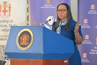 Permanent Secretary in the Ministry of Education, Skills, Youth and Information, Dr, Kasan Troupe, addresses Thursday’s (March 26) Education Transformation Oversight Committee (ETOC) Press Conference, held at Shortwood Teachers’ College in Kingston.