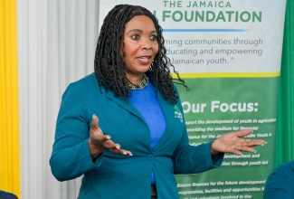 Chief Executive Officer (CEO) of Living Well Community Care Centre, Dr. Joan Williamson, delivers remarks at the handover ceremony for $1 million from Living Well Community Care Centre, in partnership with Driscoll’s Berries Company, to support youth farmers who were affected by Hurricane Melissa. The event was held on Friday (March 27) at the Foundation’s headquarters on Duke Street in Kingston.