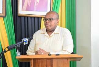 Medical Officer of Health for St. Thomas, Dr. D’Oyen Smith, presents his report during the St. Thomas Municipal Corporation’s monthly meeting on March 12.