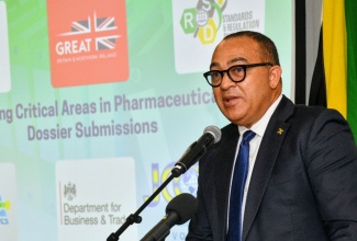 Minister of Health and Wellness, Dr. the Hon. Christopher Tufton, addresses a pharmaceutical symposium on Thursday (March 19), at The Jamaica Pegasus hotel in New Kingston.

