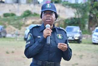 Head of the Jamaica Constabulary Force (JCF) Domestic Violence Intervention Unit, Deputy Superintendent of Police (DSP,) Jacqueline Dillon, gives remarks during the unit