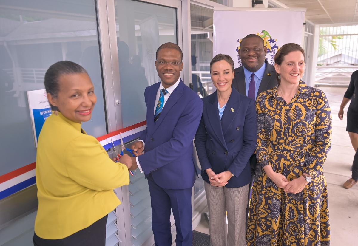 Minister of Foreign Affairs and Foreign Trade, Senator the Hon. Kamina Johnson Smith (centre), and Parliamentary Secretary in the Ministry of Education, Skills, Youth and Information, Senator Marlon Morgan (second right), participate in the official opening of Alliance Française de la Jamaïque