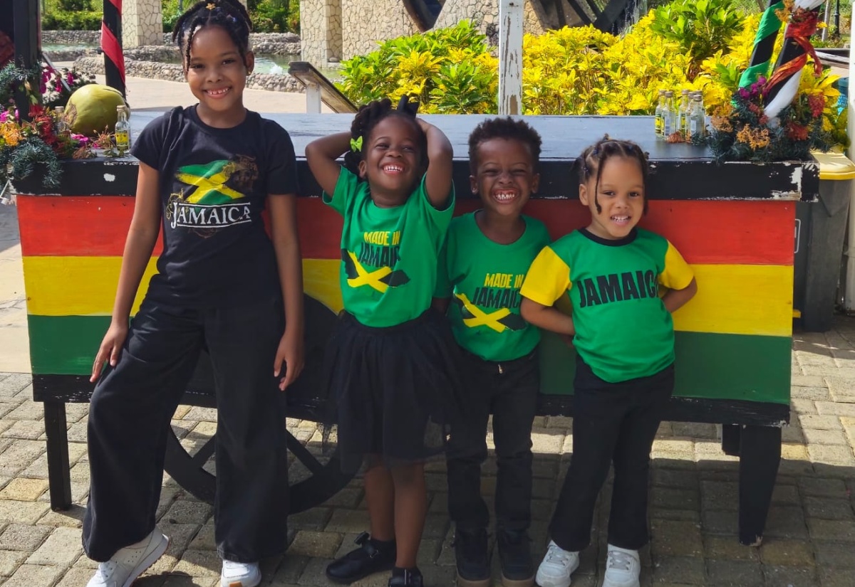 Hosanna Preparatory School students (from left) Savannah Stewart, Azalea Walters, Judah Walters, and Rayne Stewart, are decked in the national colours for Jamaica Day celebrations at the school in St. James on Friday (February 27).  The day was a showcase of Jamaican culture through food,  music and other activities.

