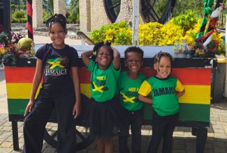 Hosanna Preparatory School students (from left) Savannah Stewart, Azalea Walters, Judah Walters, and Rayne Stewart, are decked in the national colours for Jamaica Day celebrations at the school in St. James on Friday (February 27).  The day was a showcase of Jamaican culture through food,  music and other activities.

