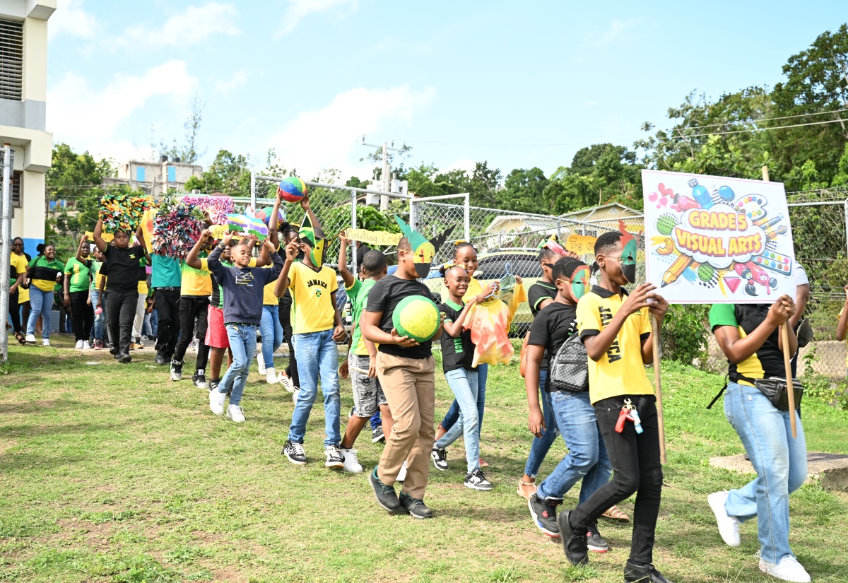 Students, decked in the national colours, participate in a parade showcasing Jamaica’s immense global impact through music, athletics, and cultural achievement, during Jamaica Day celebrations at Steer Town Primary and Infant School in St. Ann on February 27.

