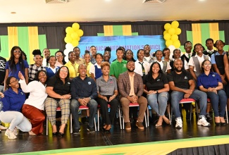 Chairman of the St. James Municipal Corporation, Councillor Richard Vernon (seated, fourth right), joins the Jamaica Information Service (JIS) team, sponsors, content creators and student participants at the JIS Social Media for Social Change workshop held recently at the Montego Bay Cultural Centre in St. James.