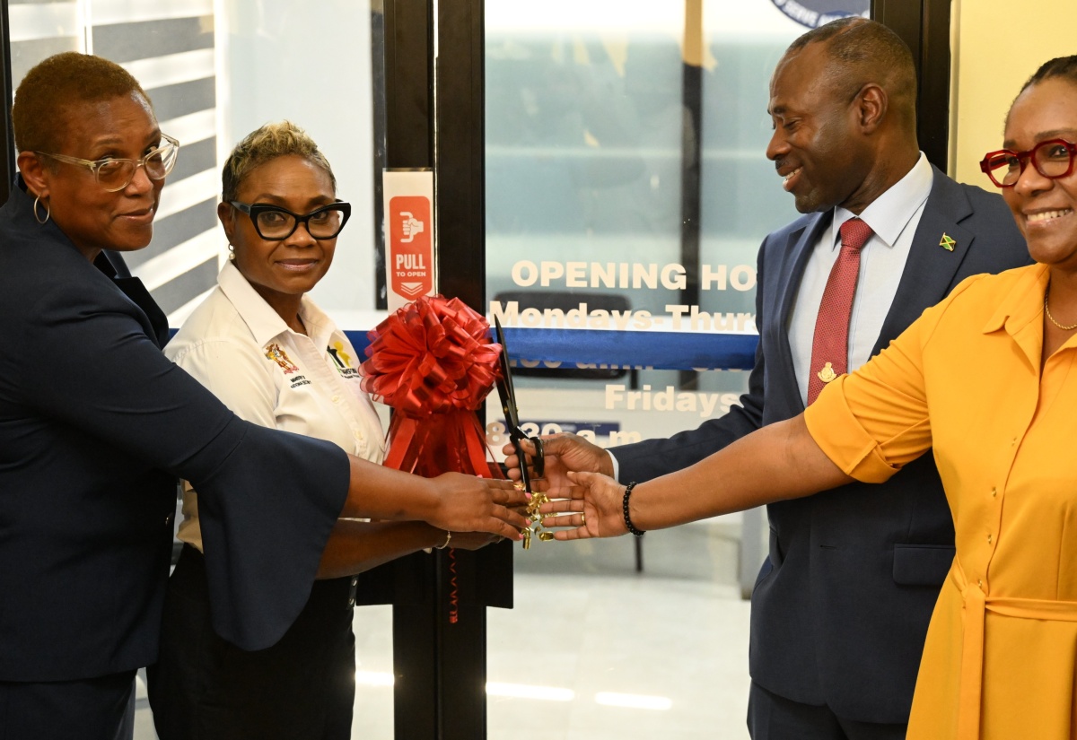 State Minister in the Ministry of National Security and Peace, Hon. Juliet Cuthbert-Flynn (second left), cuts the ribbon to officially open the new St. James Probation Office in Montego Bay on Friday (March 13). She is joined by (from left) Principal Probation Aftercare Officer, Yvette Boucher-Gordon; Commissioner of Corrections, Brigadier (Ret’d) Radgh Mason; and Permanent Secretary in the Ministry, Ambassador Alison Stone Roofe.
