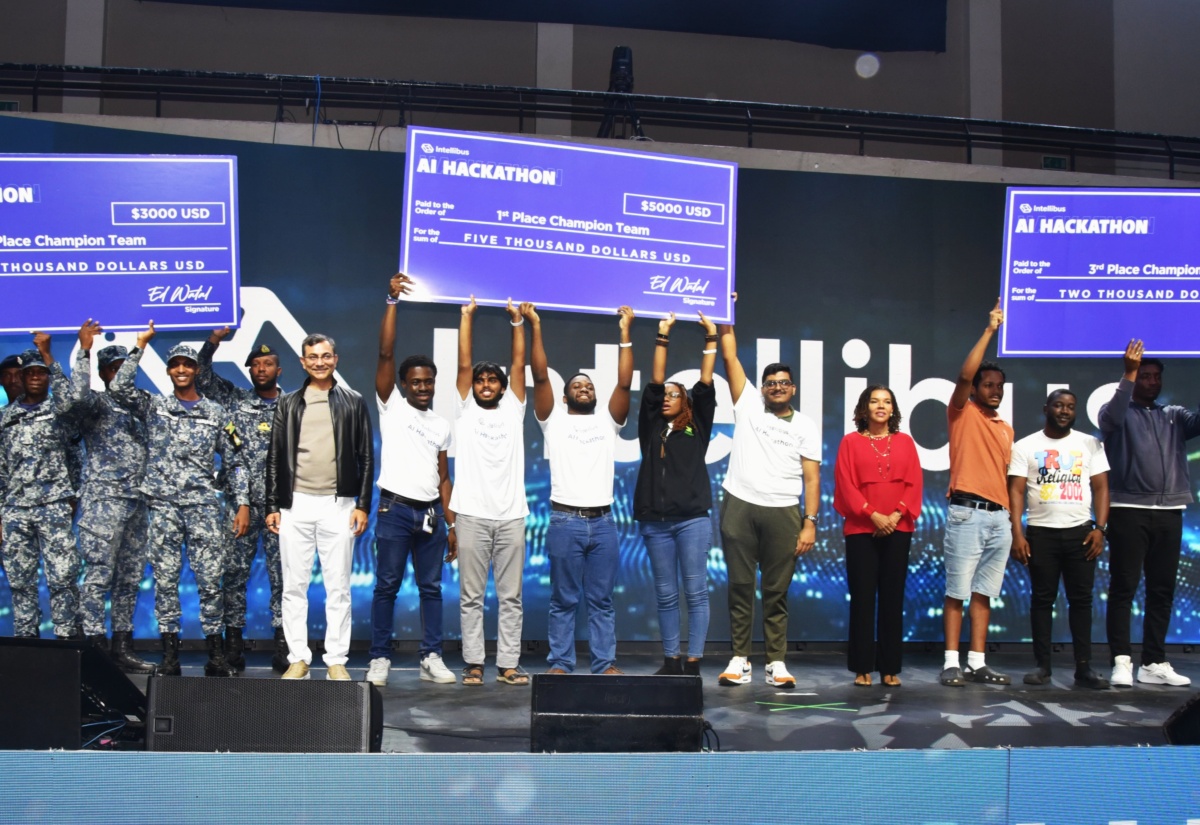 Minister without Portfolio in the Office of the Prime Minister responsible for Efficiency, Innovation and Digital Transformation, Ambassador the Hon. Audrey Marks (sixth right), and Founder of Intellibus, Ed Watal (eighth left), share lens with the top three teams in the Intellibus Artificial Intelligence (Al) Hackathon. The awards ceremony was held on Sunday (March 15) at the National Arena in Kingston, on Sunday (March 15). 


