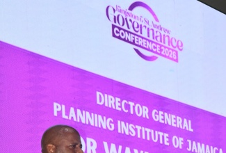 Sergeant Andrew Williams of the Community Safety and Security Branch of the Jamaica Constabulary Force (JCF) speaks to JIS News during a Youth Opportunities Exposition at the Paul Bogle Vocational Training Institute in St. Thomas on Thursday (March 26).
