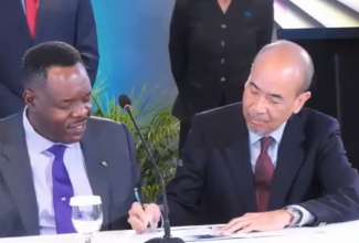 President of the Jamaica Employers’ Federation (JEF), Wayne Chen (right), and Caribbean Examinations Council (CXC) Registrar and Chief Executive Officer, Dr. Wayne Wesley, sign the Partnership Engagement Agreement (PEA) during the 2026 CXC Ministerial Forum opening ceremony, held at The Jamaica Pegasus hotel in New Kingston on Thursday (March 19). The partnership agreement aims to address persistent gaps between educational output and the readiness of young people for both the modern workforce and their role in society.

