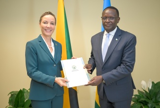 Minister of Foreign Affairs and Foreign Trade, Senator the Hon. Kamina Johnson Smith, receives Letters of Credence from High Commissioner-designate of the Republic of Rwanda to Jamaica, His Excellency Martin Ngoga, at the Ministry’s offices in downtown Kingston on Tuesday (March 17).

