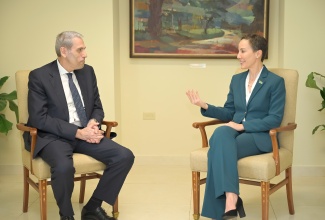 Minister of Foreign Affairs and Foreign Trade, Senator the Hon. Kamina Johnson Smith, converses with Ambassador-designate of the Hellenic Republic of Greece to Jamaica, His Excellency Efthymios Efthymiades, at the Ministry’s offices in downtown Kingston on Tuesday (March 17).

