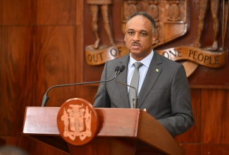 Managing Director of the Jamaica Social Investment Fund (JSIF), Omar Sweeney, delivers remarks during a Press Conference at Jamaica House in Kingston on Monday (March 30).
