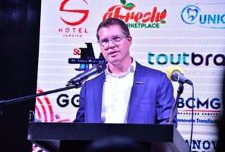 Executive Chairman of Sandals Resorts International (SRI), Adam Stewart, speaks during the 2026 launch of the Jill Stewart MoBay City Run, held at the S Hotel in Montego Bay, St. James, recently.