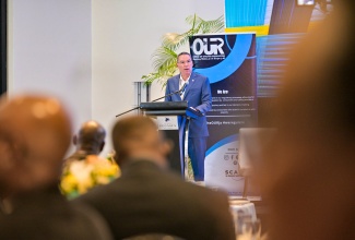Energy, Transport and Telecommunications Minister,  Hon. Daryl Vaz, addresses the Office of Utilities Regulation (OUR) 12th Annual Director- General’s Stakeholders Engagement, on Thursday (March 19), at The Jamaica Pegasus hotel in Kingston.

