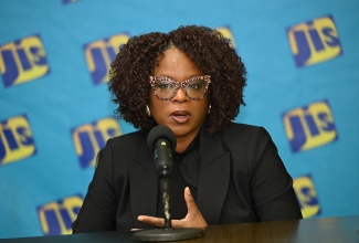 Deputy Chief Executive Officer and Director of Operations at the Companies Office of Jamaica (COJ), Laurie-Ann Jackson, speaks during a Jamaica Information Service (JIS) 