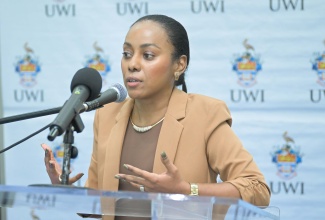Senior Lecturer in the Department of Basic Medical Sciences, University of the West Indies (UWI), Dr. Simone Badal, addresses the launch of the Faculty of Medical Sciences (FMS) Research Support Fund at the Mona Campus on April 28.
