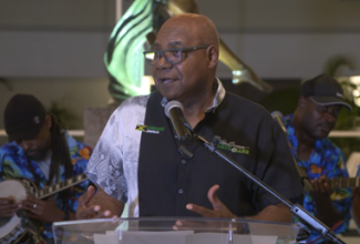 Tourism Minister, Hon. Edmund Bartlett, addresses the official reopening ceremony for Bahia Principe Runaway Bay in St. Ann on Wednesday (April 1). 