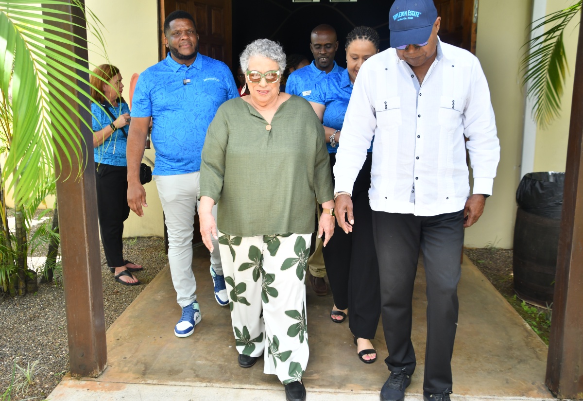 Tourism Minister, Hon. Edmund Bartlett (right), tours a section of the Appleton Estate Rum Tour in St. Elizabeth with Master Blender, Joy Spence (centre), and J. Wray and Nephew Jamaica General Manager, Cecil Smith Jr. (left). The visit, on Thursday (April 23), formed part of the Ministry’s South Coast Confidence Tour.