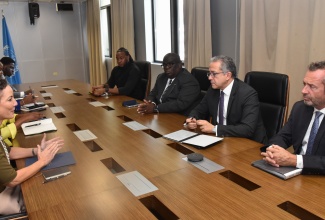 Minister of Foreign Affairs and Foreign Trade, Senator the Hon. Kamina Johnson Smith (left), engages in discussion with Director General of the United Nations Educational, Scientific and Cultural Organization (UNESCO), Professor Khaled El‑Enany (second right); UNESCO Regional Director and Representative for the Caribbean, Eric Falt (right); UN Resident Coordinator in Jamaica, Dennis Zulu (third right), and other stakeholders. The meeting took place during a courtesy call at the Ministry in downtown Kingston on April 2.
