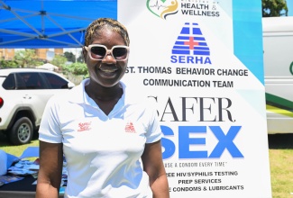 South East Regional Health Authority (SERHA) Parish Behaviour Change Communication Coordinator for St. Thomas, Nahenda Brown, participates as part of the Behaviour Change and Communication Team during an STI Awareness Month Expo at Rudolph Elder Park in Morant Bay on April 17.
