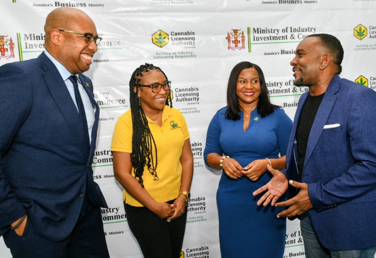 Minister of State in the Ministry of Industry, Investment and Commerce, Hon. Delano Seiveright (left), shares a light moment with (from second left) Authorisation Holder, Kimberly Myrie; Chief Executive Officer, Cannabis Licensing Authority (CLA), Farrah Blake; and President, Ganja Growers and Producers Association of Jamaica, Maurice Ellis, during the recent launch of the CLA