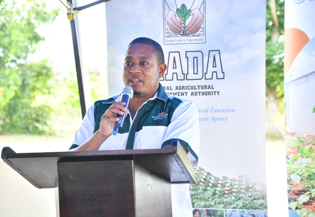 Minister of Agriculture, Fisheries and Mining, Hon. Floyd Green, addresses the handover ceremony for fertiliser and other agricultural inputs courtesy of the Food and Agriculture Organization (FAO) of the United Nations, held at the Rural Agricultural Development Authority (RADA) Trelawny branch, in Hague, recently. 

