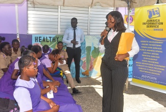 Data Protection Officer at the Jamaica Information Service (JIS), Brandy Evans, delivers a presentation to grade-nine students at Foga Road High School in Clarendon during the institution’s recent Career Day event.
