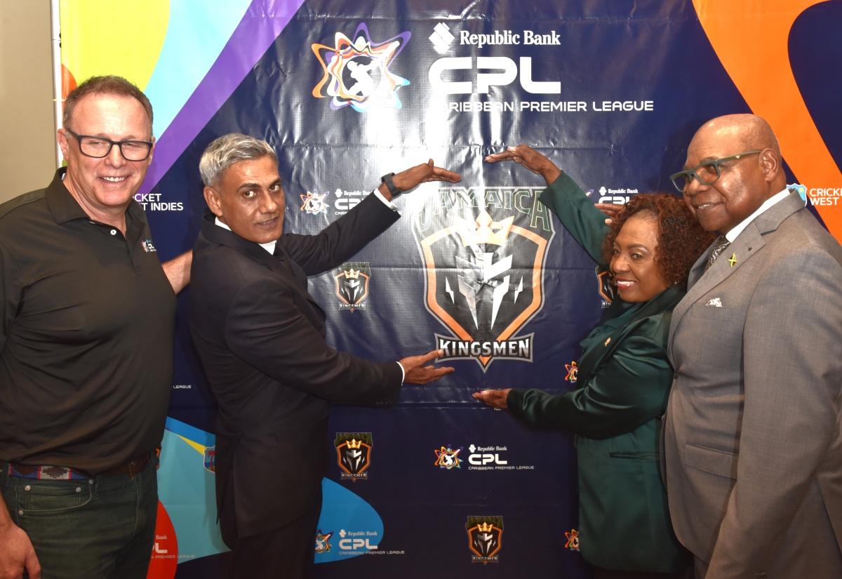 Minister of Culture, Gender, Entertainment and Sport, Hon. Olivia Grange, and Owner of the Caribbean Premier League (CPL) T20 cricket franchise, Jamaica Kingsmen, Fawad Sarwar (second left), unveil the name and logo of the new franchise during a press conference at The Jamaica Pegasus hotel in New Kingston on Tuesday (March 31). Sharing the moment are Tourism Minister, Hon. Edmund Bartlett (right), and CPL Chief Executive Officer, Pete Russell.
