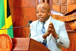 Minister of Labour and Social Security, Hon. Pearnel Charles Jr., addresses Wednesday’s (April 15) Post Cabinet Press Briefing at Jamaica House.
