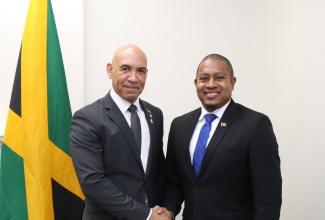 Minister of Agriculture, Fisheries and Mining, Hon. Floyd Green (right), is greeted by Jamaica’s Ambassador to the United States (US), His Excellency Major General (Ret’d) Antony Anderson, during a recent courtesy call at the Embassy in Washington DC.  Minister Green was in Washington for the recent Agriconnect Latin America and the Caribbean Round Table. The Minister also participated in a bilateral meeting with representatives of the World Bank and Inter-American Institute of Cooperation on Agriculture (IICA) to discuss the Agriconnect Action Plan for Jamaica. 
