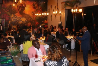 Tourism Minister, Hon. Edmund Bartlett (right), addresses over 90 travel advisors from Northeast United States during the Jamaica Tourist Board (JTB) Travel Advisory Reception at Catherine’s Restaurant in Laurel, Maryland, on April 7.
