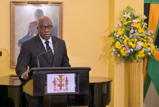 Chief Justice, Hon. Bryan Sykes, delivers remarks during Thursday's (April 9) swearing-in ceremony at King's House for members of the judiciary.

