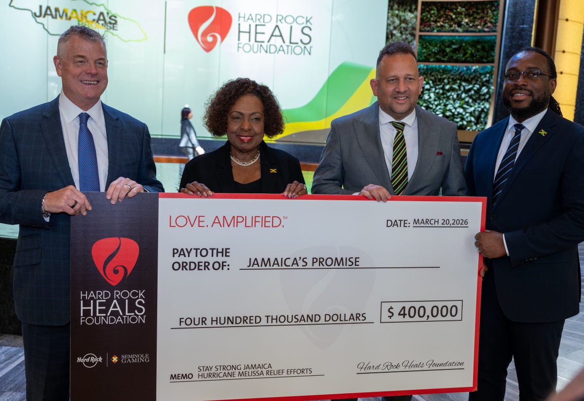 Caption: Chief Operating Officer of Seminole Gaming, David Hoenemeyer (left) recently presented a cheque valued at US$400,000 to Minister of Culture, Gender, Entertainment and Sport, Hon. Olivia Grange (second left) at the Hard Rock Hotel in Hollywood, Florida. Sharing in the moment were Consul-General of Jamaica to Miami, Oliver Mair (second right), and Jamaica's Promise representative, Chris Benjamin (right).