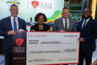 Caption: Chief Operating Officer of Seminole Gaming, David Hoenemeyer (left) recently presented a cheque valued at US$400,000 to Minister of Culture, Gender, Entertainment and Sport, Hon. Olivia Grange (second left) at the Hard Rock Hotel in Hollywood, Florida. Sharing in the moment were Consul-General of Jamaica to Miami, Oliver Mair (second right), and Jamaica