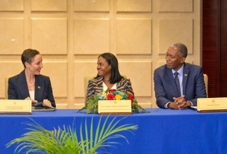Minister of Foreign Affairs and Foreign Trade, Senator the Hon. Kamina Johnson Smith (left), in discussion with Permanent Secretary in the Ministry of Energy, Transport and Telecommunications, Kedesha Campbell Rochester (centre), and Director General at the Maritime Authority of Jamaica (MAJ), Bertrand Smith. The occasion was the opening ceremony commemorating the 50th anniversary of Jamaica’s membership in the International Maritime Organization (IMO), held at the Foreign Affairs Ministry in downtown Kingston on Tuesday (May 12). It was held under the theme‘Jamaica and the IMO: 50 Years Advancing Safe, Secure and Sustainable Shipping’.
